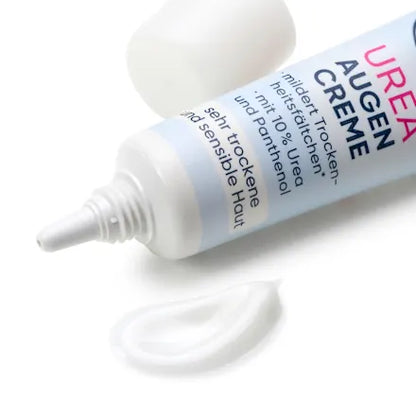 Urea eye cream tube with visible text on a white background