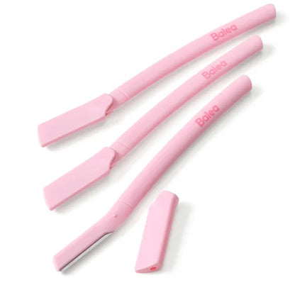 Set of pink makeup tools with 'Belle' branding on a white background