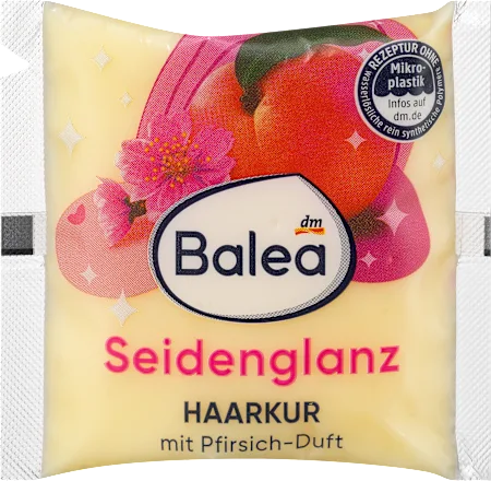 Balea hair care product packaging with apricot illustration and 'Seidenglanz' text.