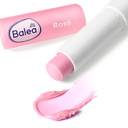 Balea Rose lip balm with pink packaging on a white background