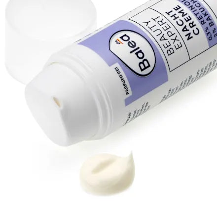 Badea beard exfoliant tube with a small amount of product on a white background